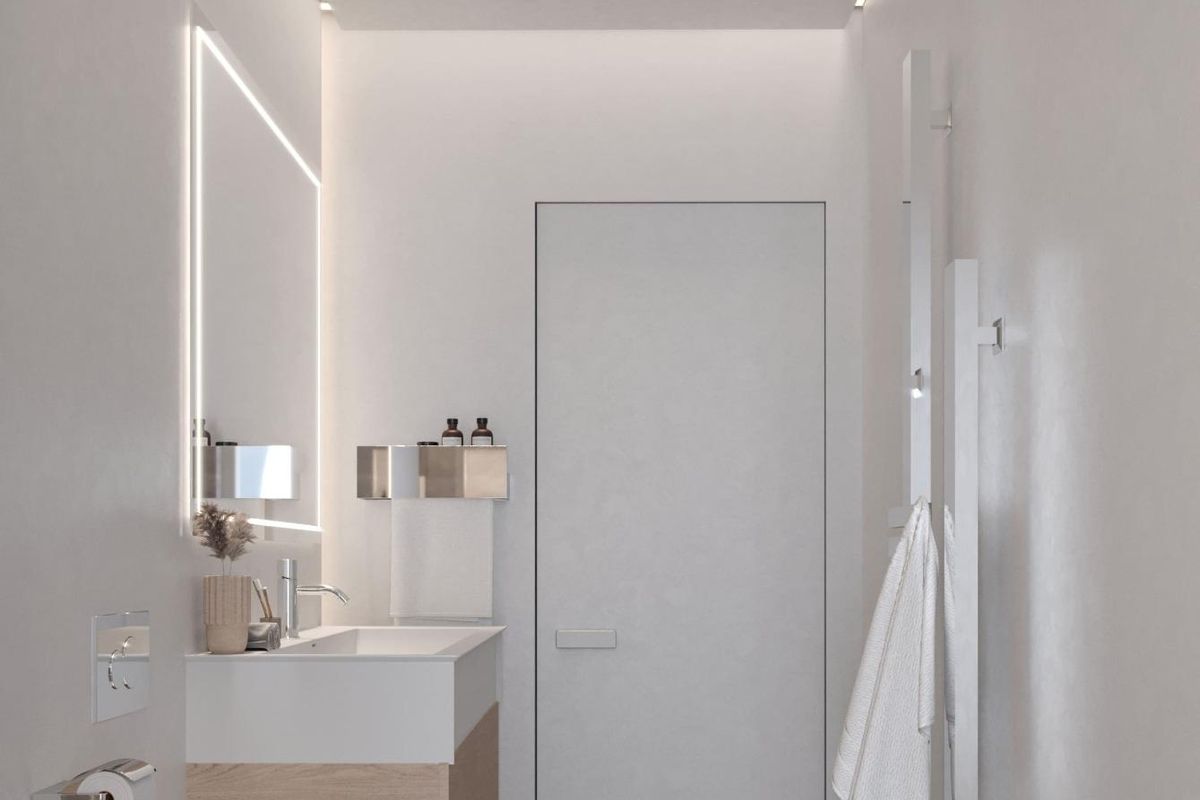 Stijlvol badkamergebied met eigentijdse armaturen en zachte verlichting, gelegen in een villa in Mijas.