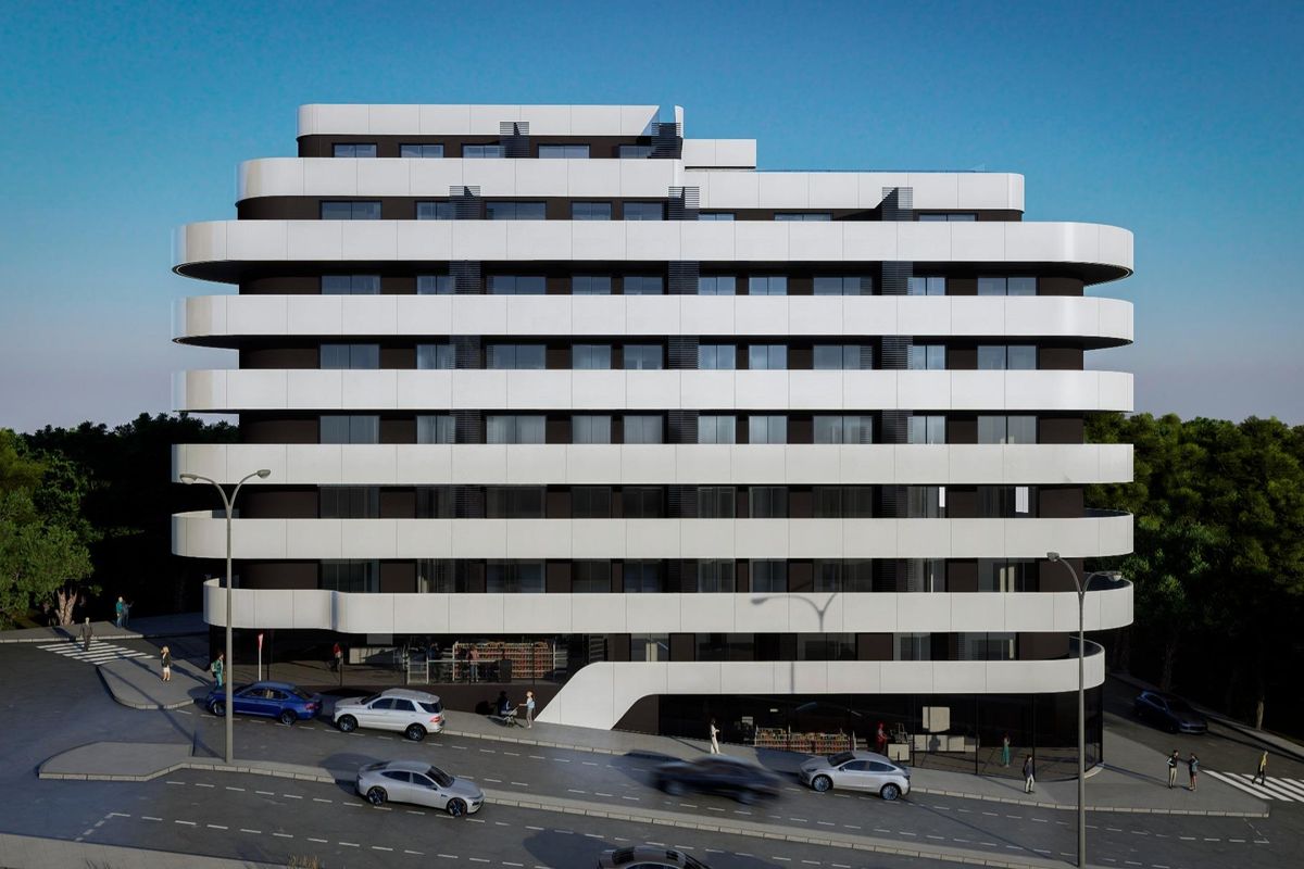 Buitenzicht op een modern appartementengebouw in Calpe met unieke architectonische vormgeving.