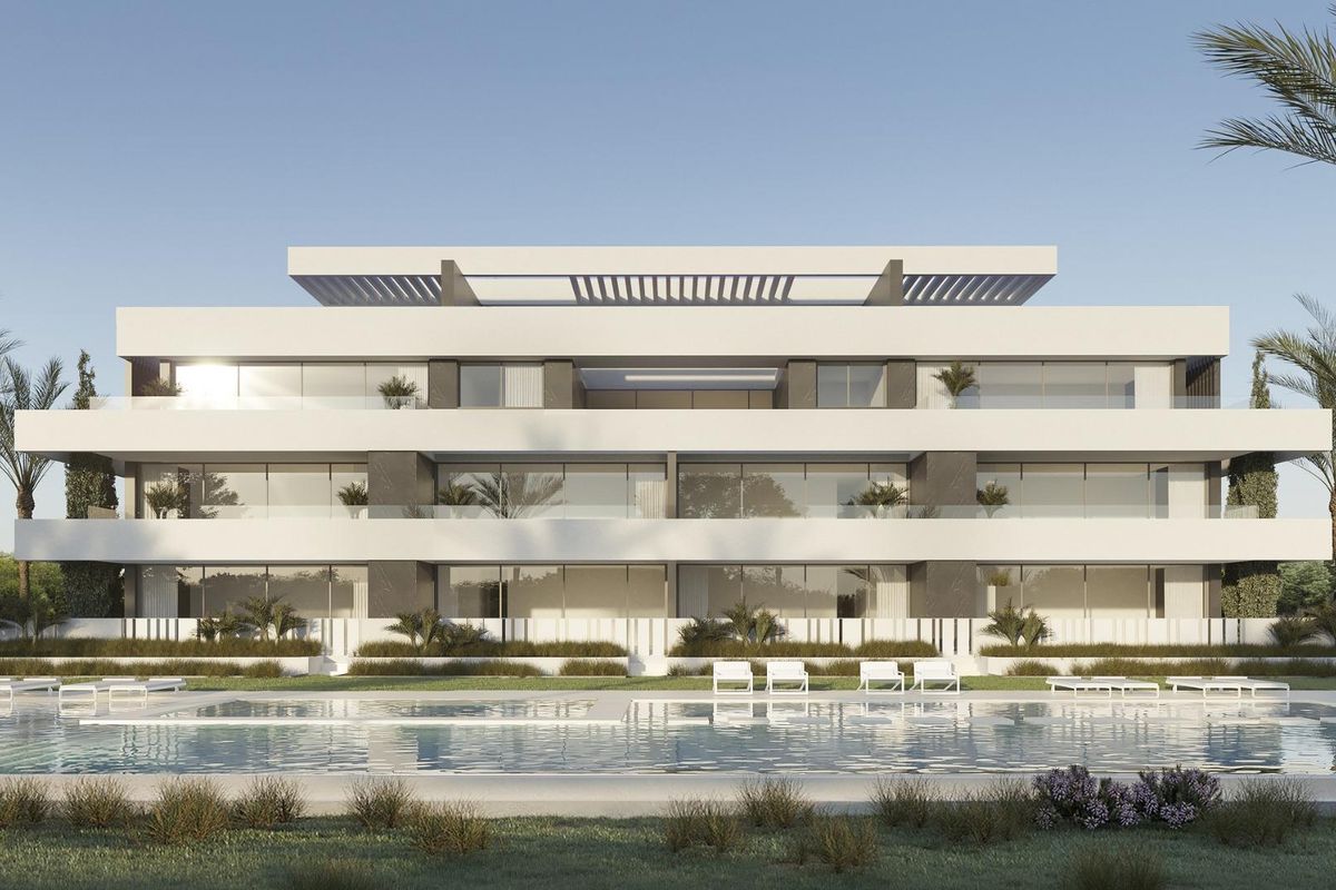 Gevel van de penthousegebouwen met moderne architectuur en weelderige beplanting in La Nucia.