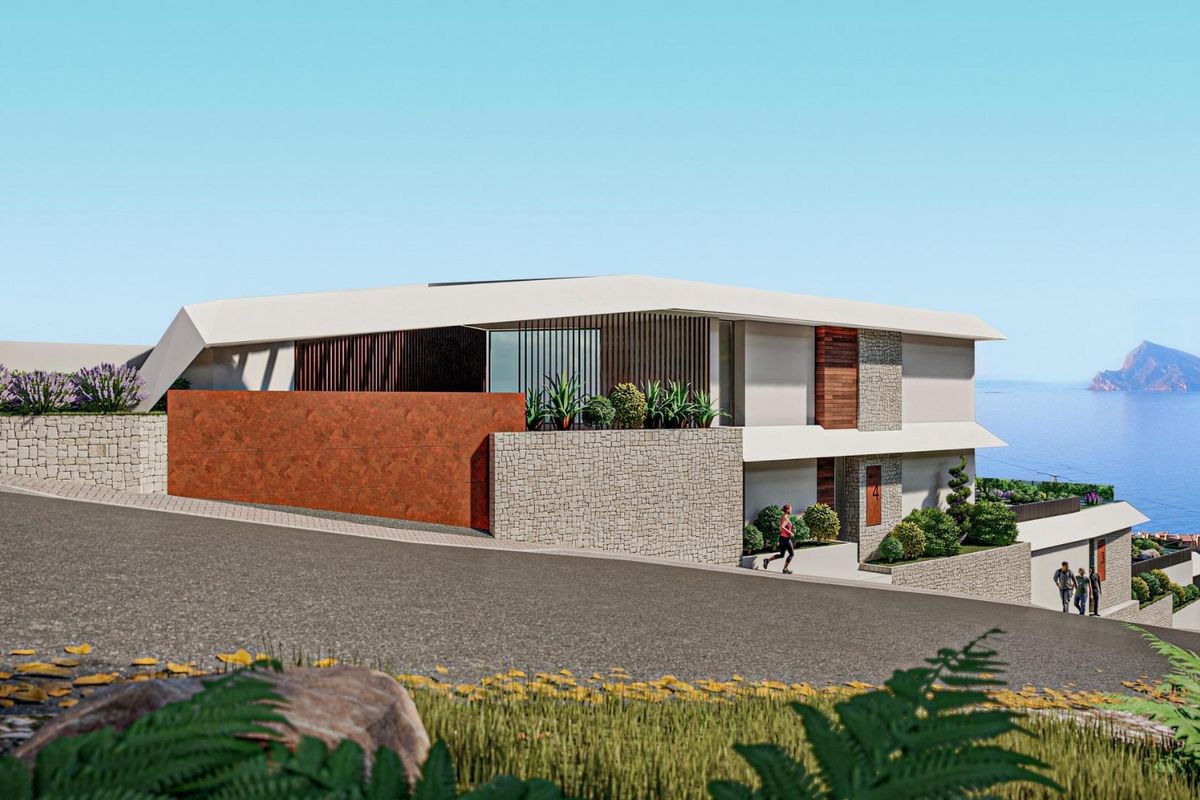 Stijlvol exterieur van een villa in Calpe met een opvallend ontwerp en mooie landscaping.