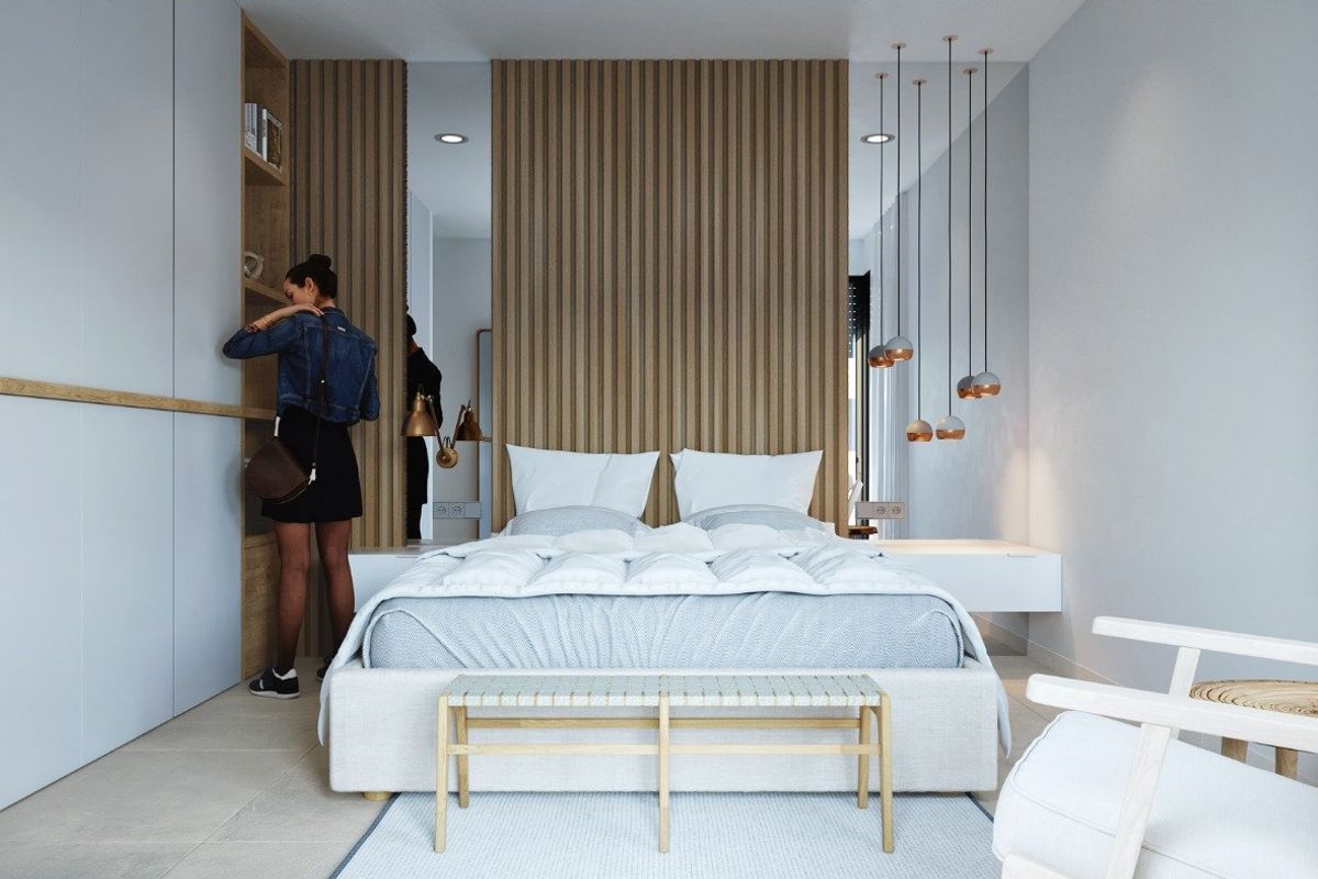 Stijlvolle slaapkamer met elegante decoratie en praktische opslag in een villa in Baños y Mendigo.