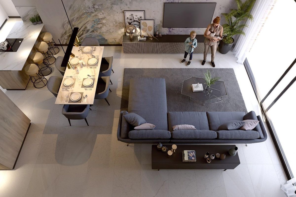 Bovenaanzicht van de woon- en eetruimte in de villa, met moderne meubels in Algorfa.