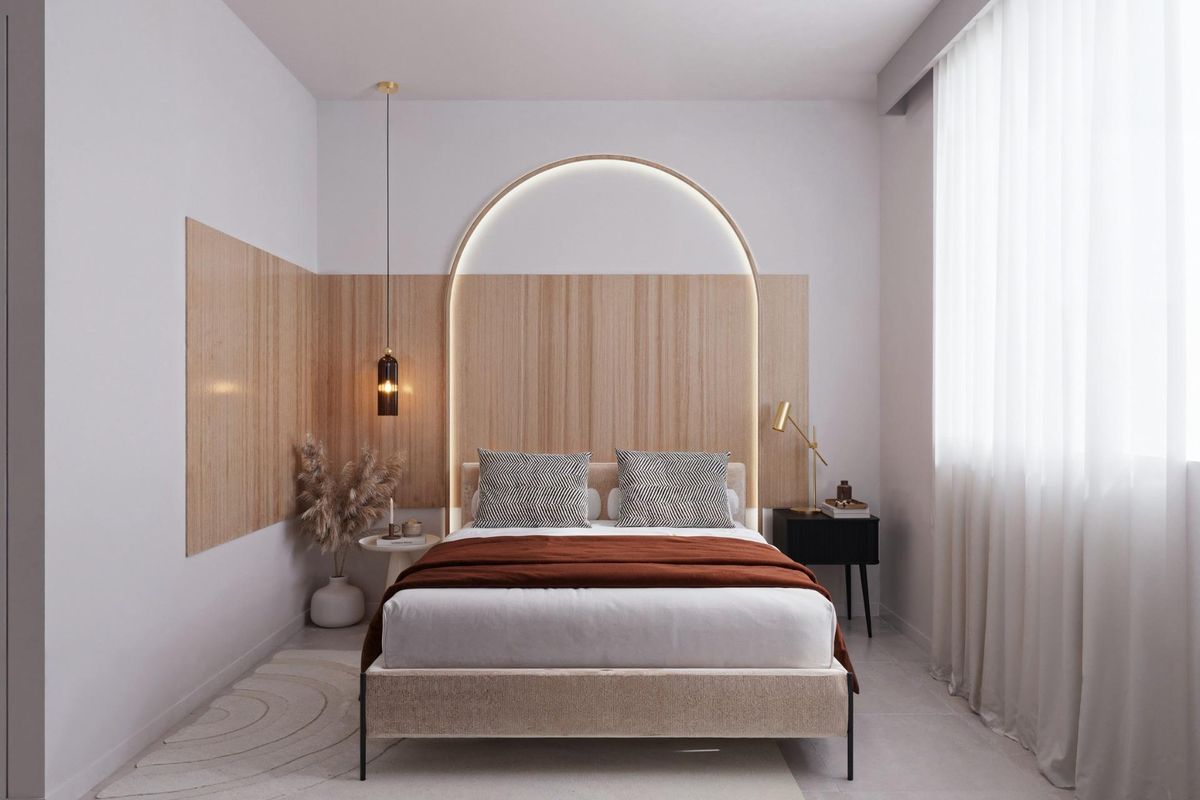 Gezellige slaapkamer in een moderne bungalow met 3 slaapkamers in San Miguel de Salinas, met warme verlichting en decor.