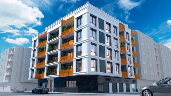 Modern 3-slaapkamer appartement gebouw in Torrevieja, met een stijlvolle uitstraling en levendige balkons.