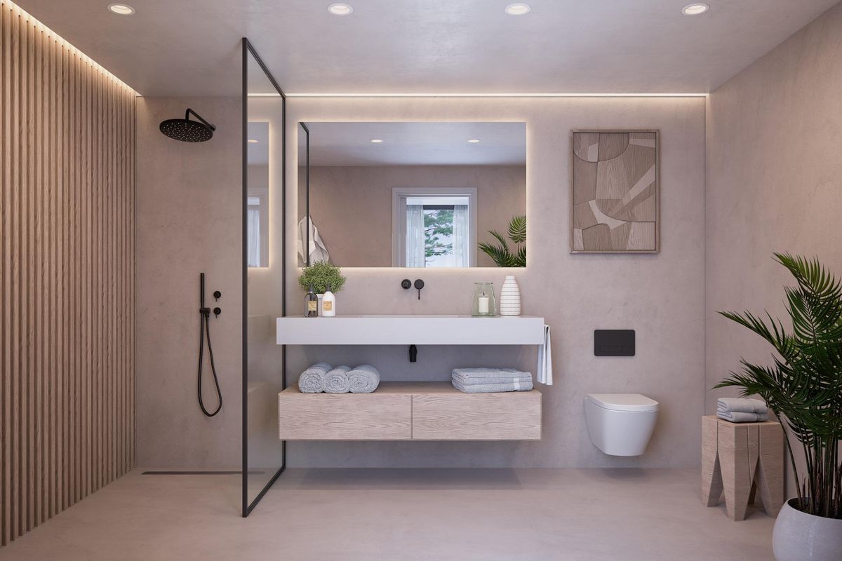 Stijlvolle badkamer in het penthouse met moderne armaturen en elegant ontwerp in Marbella.