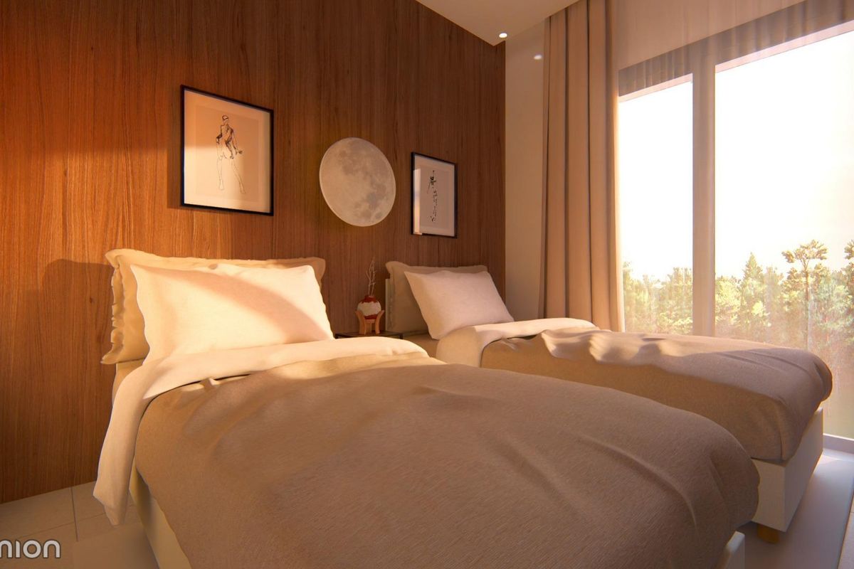 Zonverlichte slaapkamer met twee eenpersoonsbedden in een townhouse in San Javier, die comfort biedt met elegante afwerkingen.