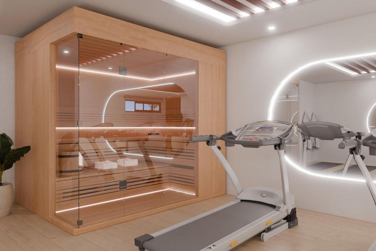 Chic thuisgym met sauna en fitnessapparatuur, gelegen in een moderne townhouse in Mijas.