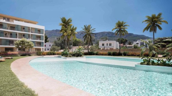 Stunning pool area with palm trees and mountain view in Denia, Costa Blanca North, perfect for relaxation.