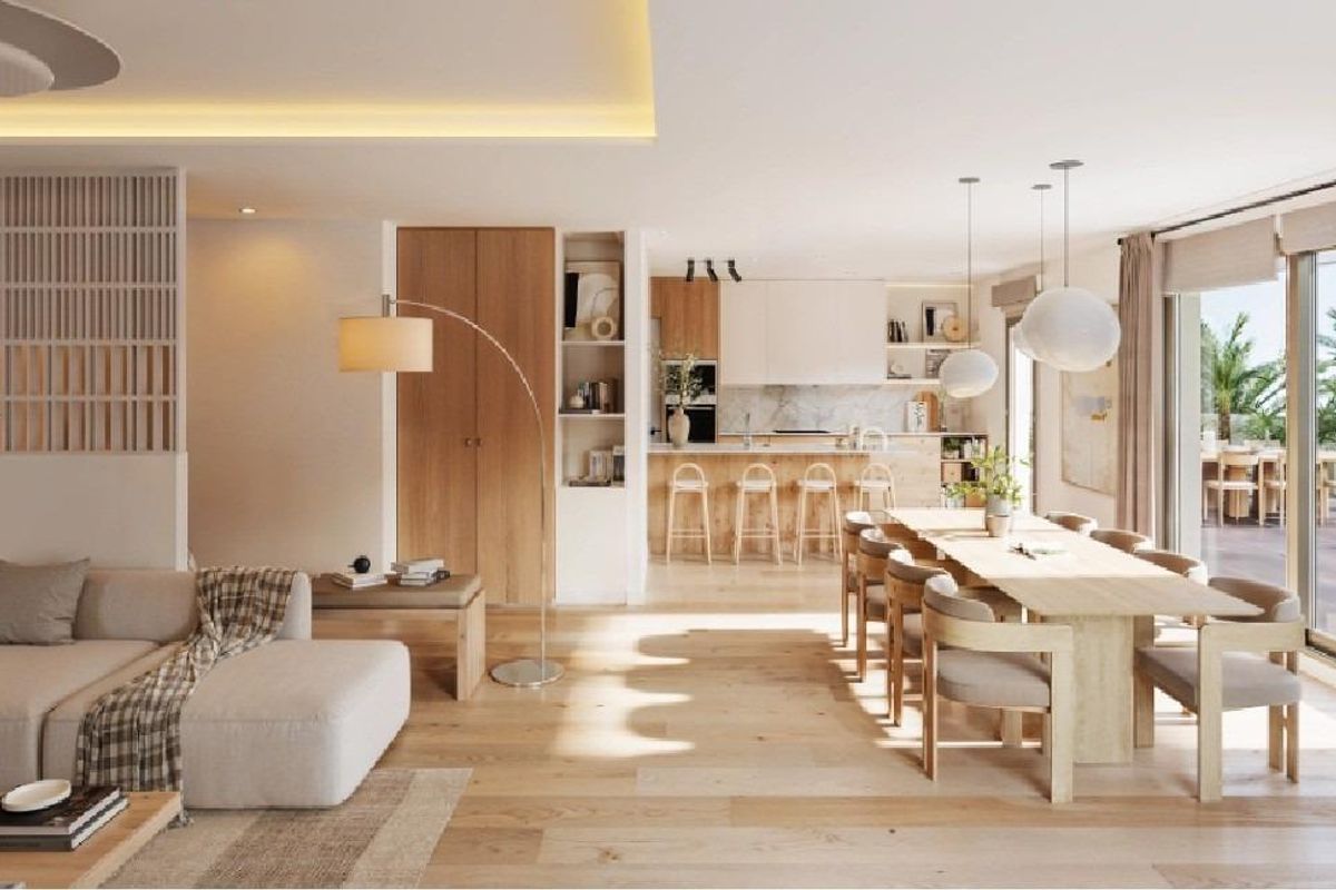 Lichtgevulde eetruimte grenzend aan een moderne keuken met een hedendaags ontwerp in een appartement in Mijas.