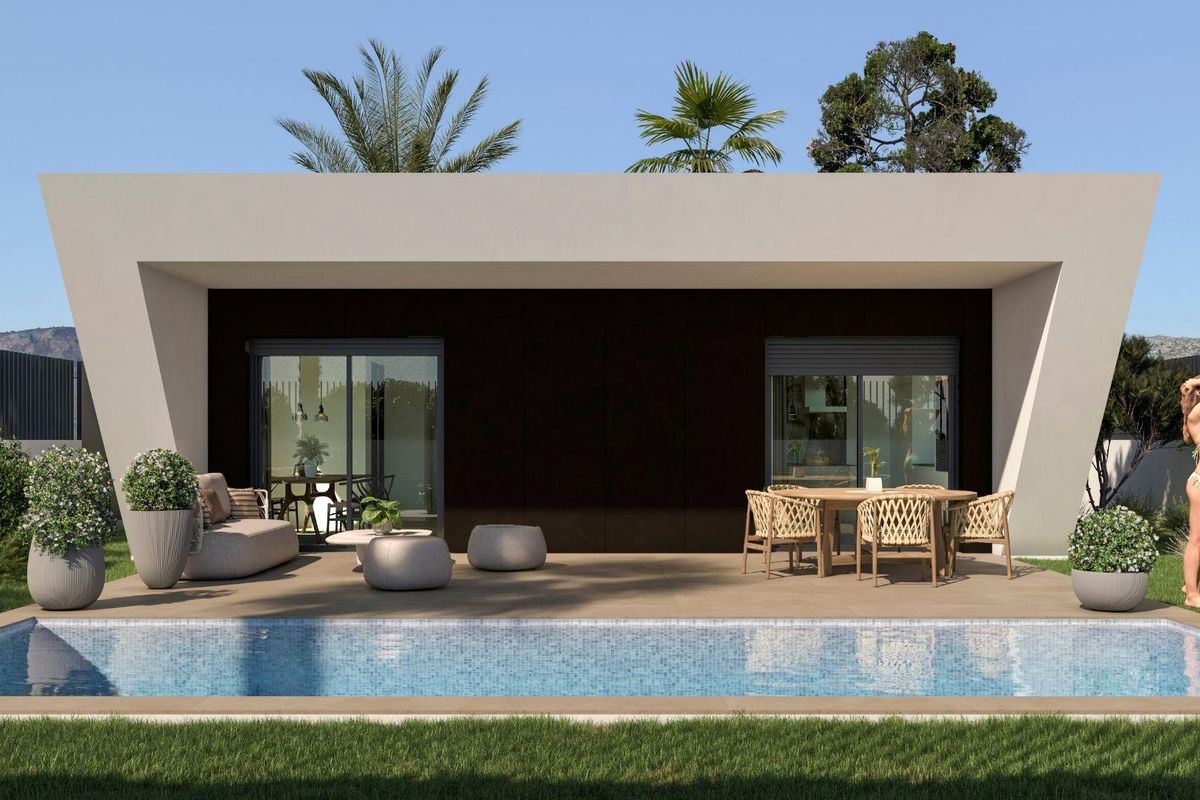 Modern 3-bed villa exterior with a terrace and pool in Monforte del Cid, Costa Blanca South, Spain.