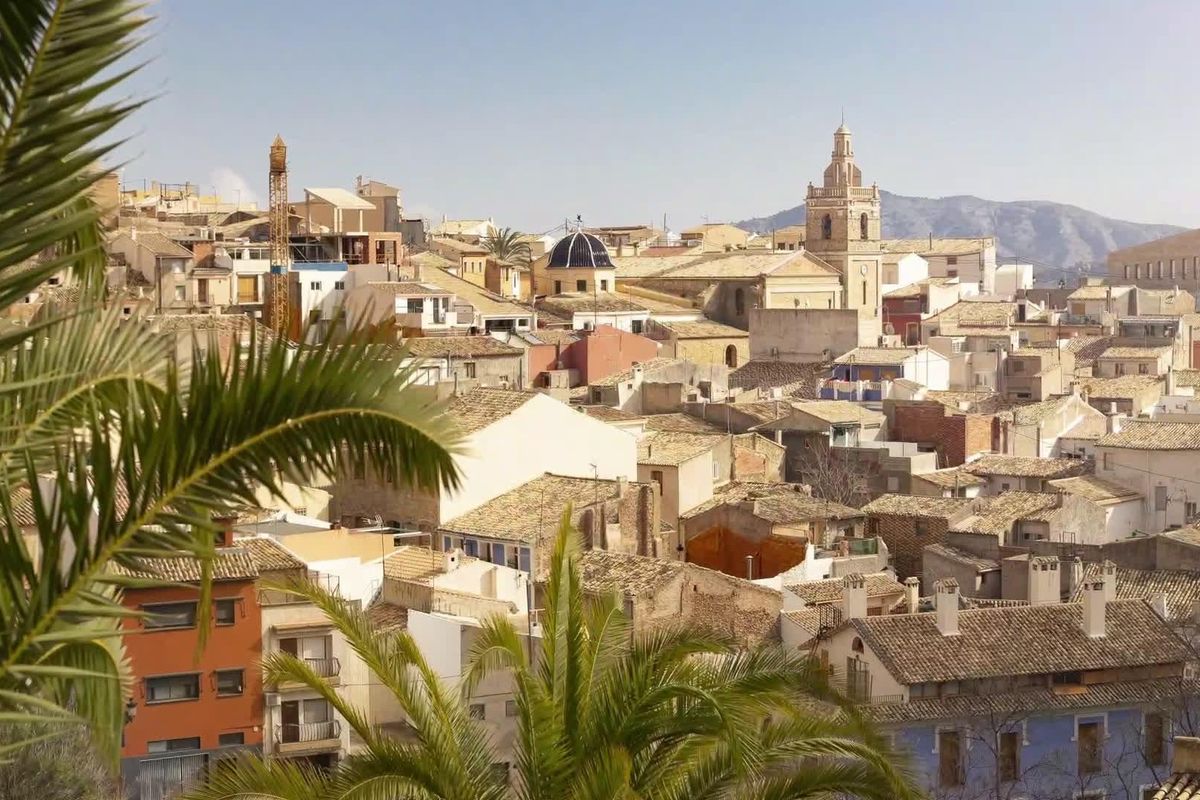Scenic view of the town of Relleu, Costa Blanca North, showing traditional Spanish architecture and a church steeple.