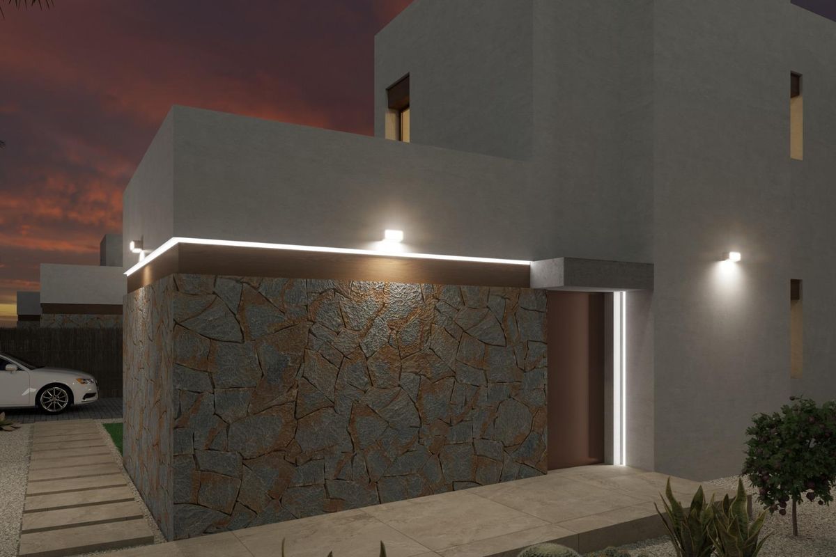 Entreezicht van de villa in Algorfa, Costa Blanca Zuid, met nadruk op steenaccenten en modern design.