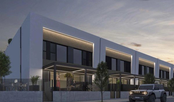 Modern 2-bed townhouse exterior in Dolores, Costa Blanca South, featuring sleek design and outdoor space.