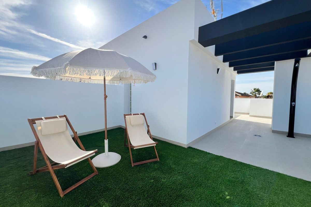 Open plan living area in Benferri town house