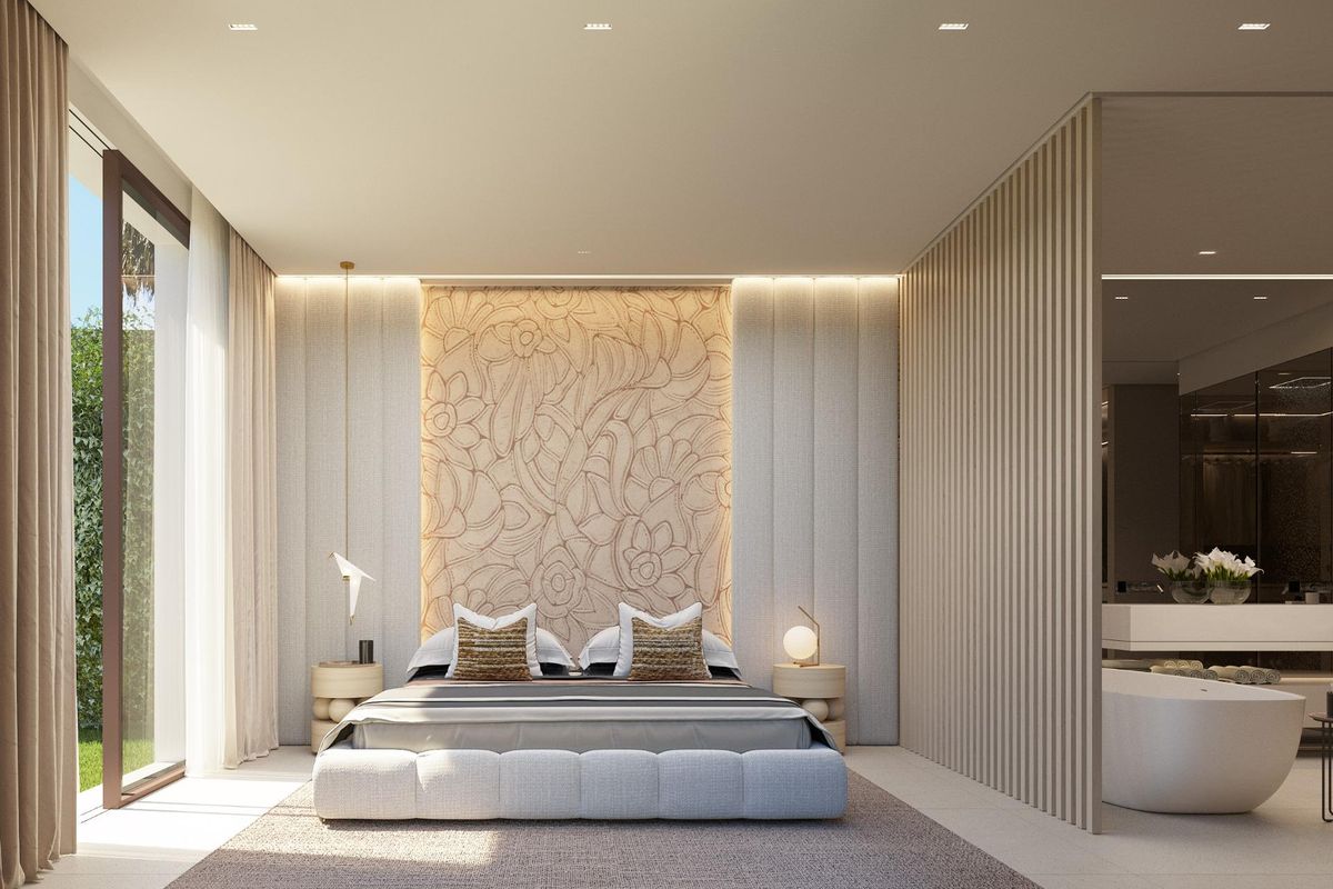 Elegante master bedroom in een villa in Marbella, met een luxe bed en verfijnde decoratie voor ontspanning.