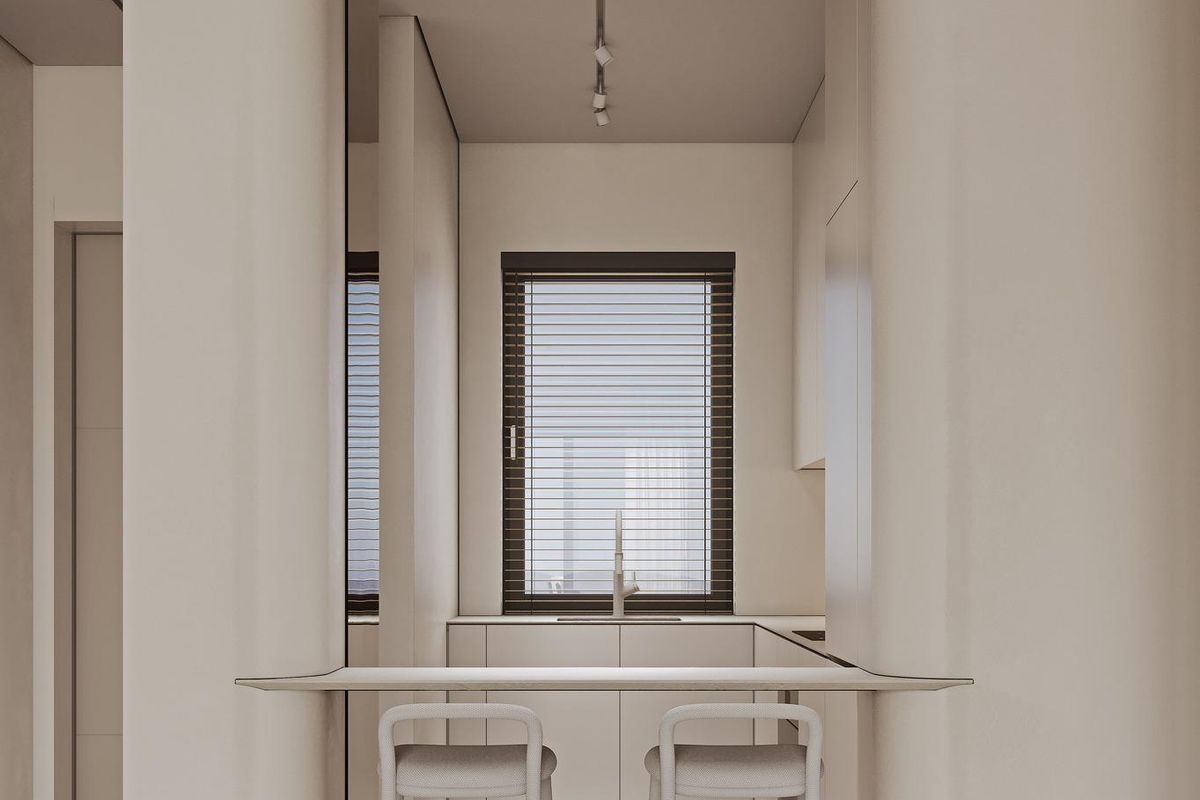 Strakke keukenruimte met een minimalistich ontwerp in een 3-slaapkamer appartement in Mijas, Costa del Sol.