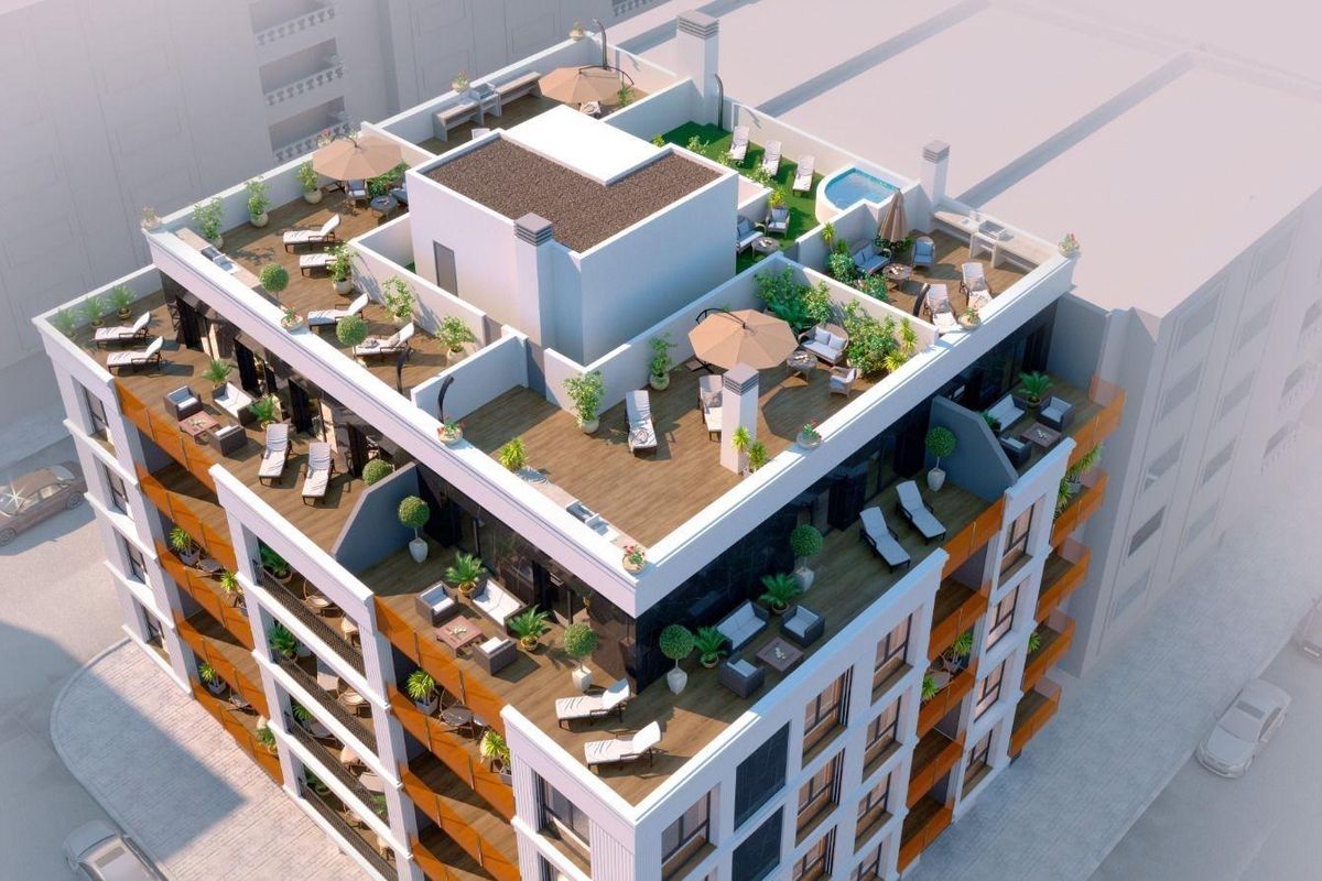 Luchtfoto van het dakterras van de penthouse, met ligstoelen en groen in Torrevieja.