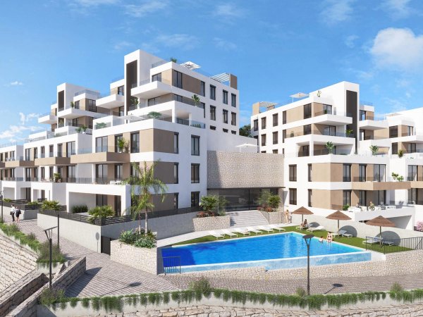 Een modern appartementscomplex in Vera, Costa de Almeria met een zwembad en aangelegde tuinen.