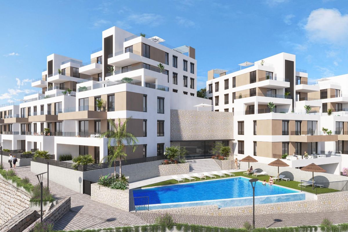Een modern appartementscomplex in Vera, Costa de Almeria met een zwembad en aangelegde tuinen.