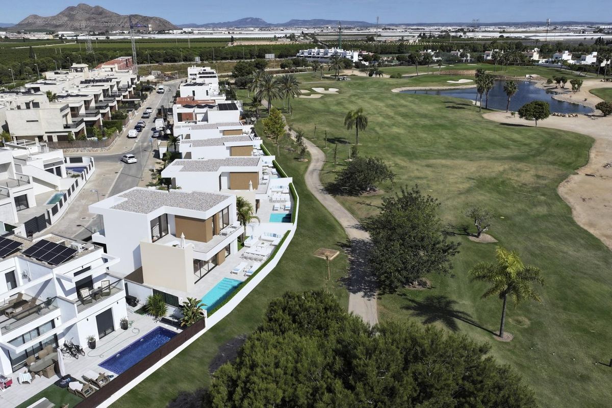Uitzicht vanaf de villa in San Javier, met uitzicht op de golfbaan en het omliggende landschap.