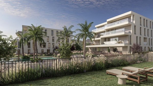 Exterior view of a modern residential complex with landscaped gardens in Benicassim, Costa Blanca North.