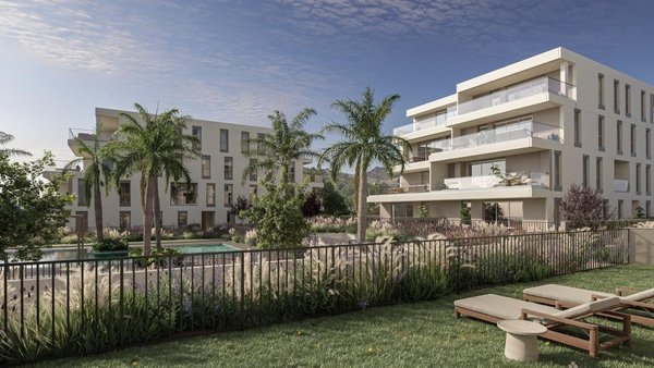Exterior view of a modern residential complex with landscaped gardens in Benicassim, Costa Blanca North.