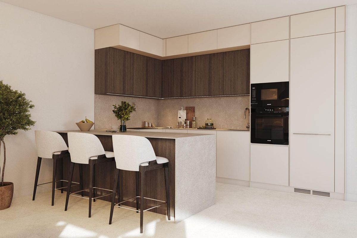 Contemporary keukeneiland met moderne afwerkingen, onderdeel van een exquisiet appartement in Málaga, Costa del Sol.