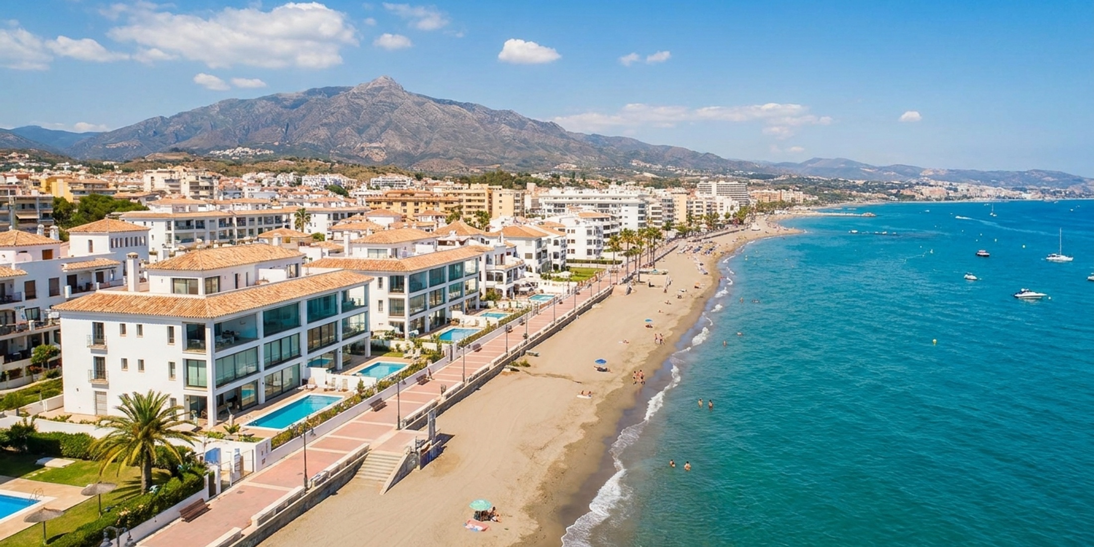 Aerial view of Torremolinos coastline and modern beachfront properties