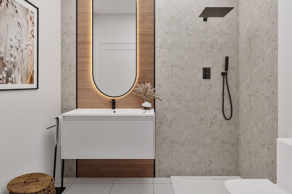 Moderne badkamer met stijlvolle armaturen en warme verlichting in een 3-slaapkamerappartement in San Miguel de Salinas.