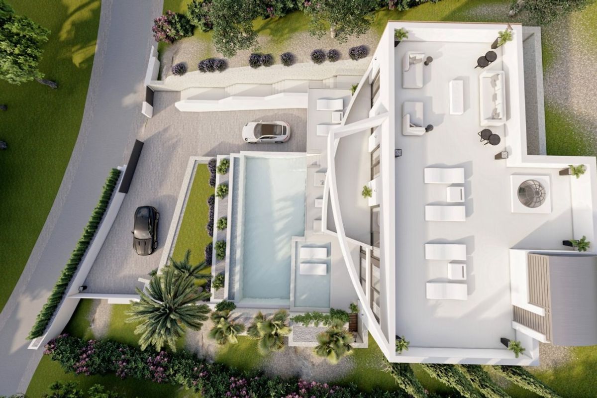 Bovenaanzicht van de ruime villa met zwembad en buitenfaciliteiten in Altea.