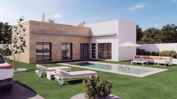 Exterior of a modern 3-bed villa in Mazarron, Spain. Features include a private pool, lawn, patio furniture, and minimalist design.