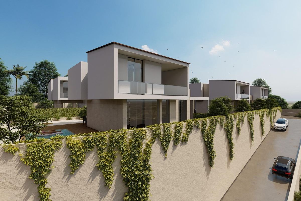 Buitenzicht op villa's in La Nucia, met nadruk op groen en eigentijds ontwerp rond privé terras.