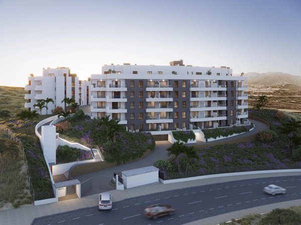 Moderne 3-slaapkamer appartementcomplex buitenkant in Mijas, Costa del Sol, met een strakke vormgeving en omgeving.