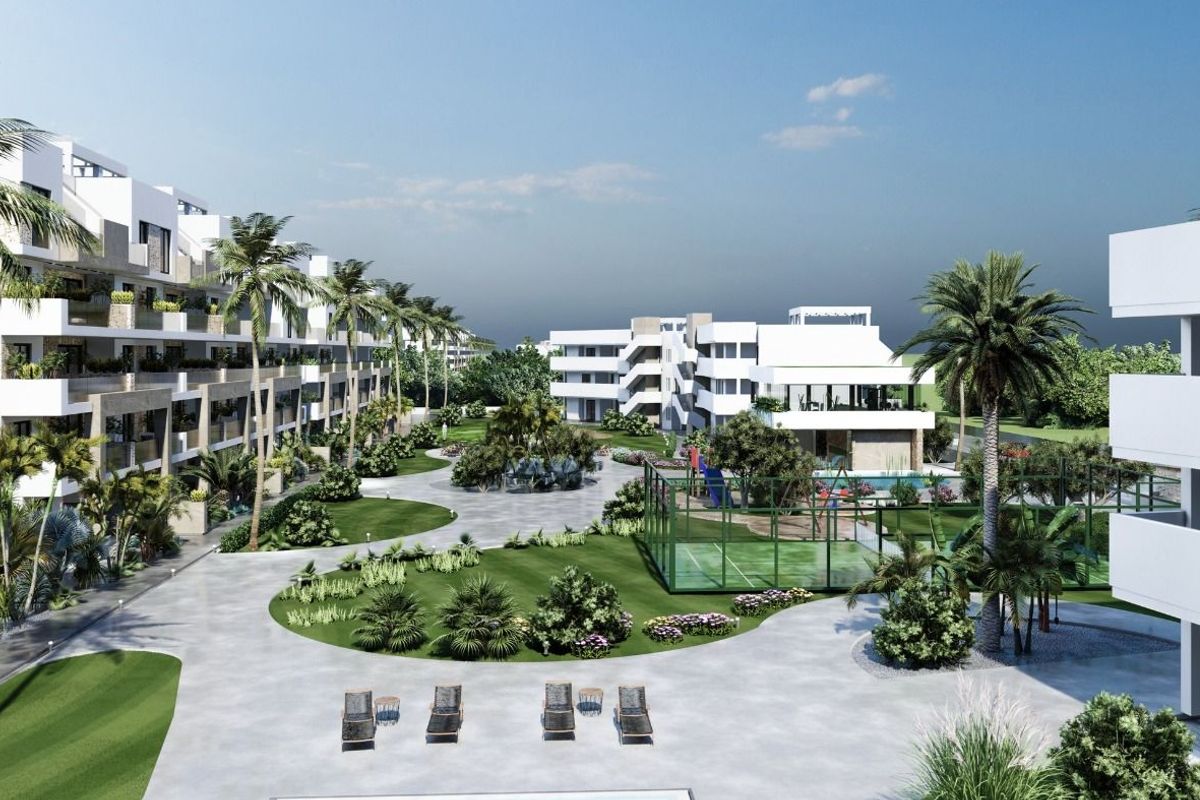 View of beautifully landscaped gardens and recreation areas within the resort-style apartment complex.