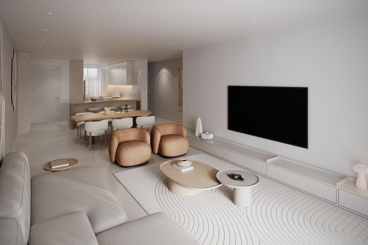 Hedendaagse woonkamer van een appartement met 2 slaapkamers in Estepona, met strakke meubels en decor.