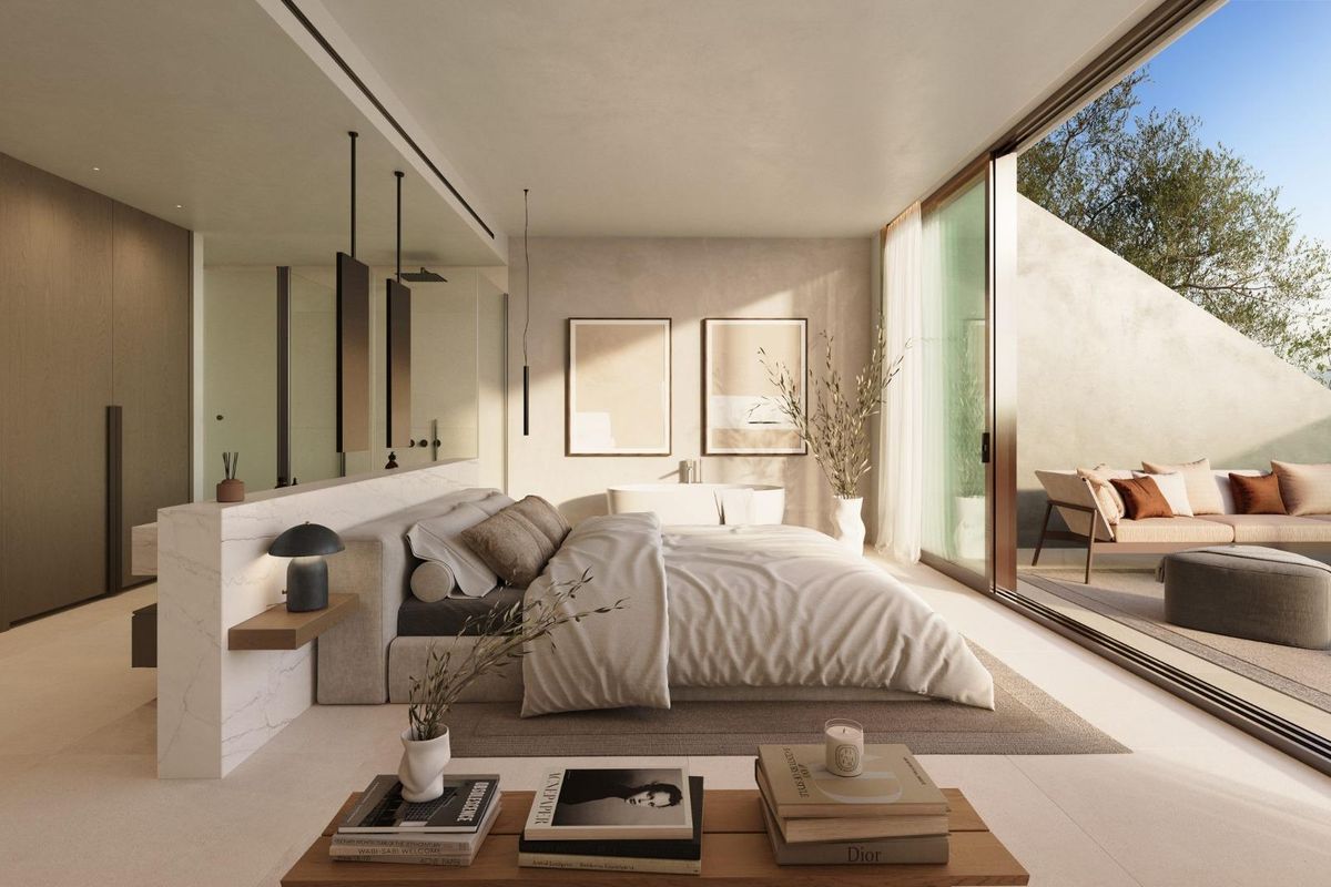 Heldere en luchtige slaapkamer in een appartement in Fuengirola, met grote ramen en minimalistische decoratie.