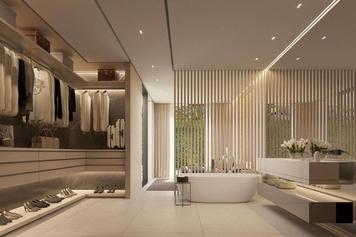 Moderne badkamer en kastgebied met natuurlijk licht in een luxe villa in Marbella, Costa del Sol.