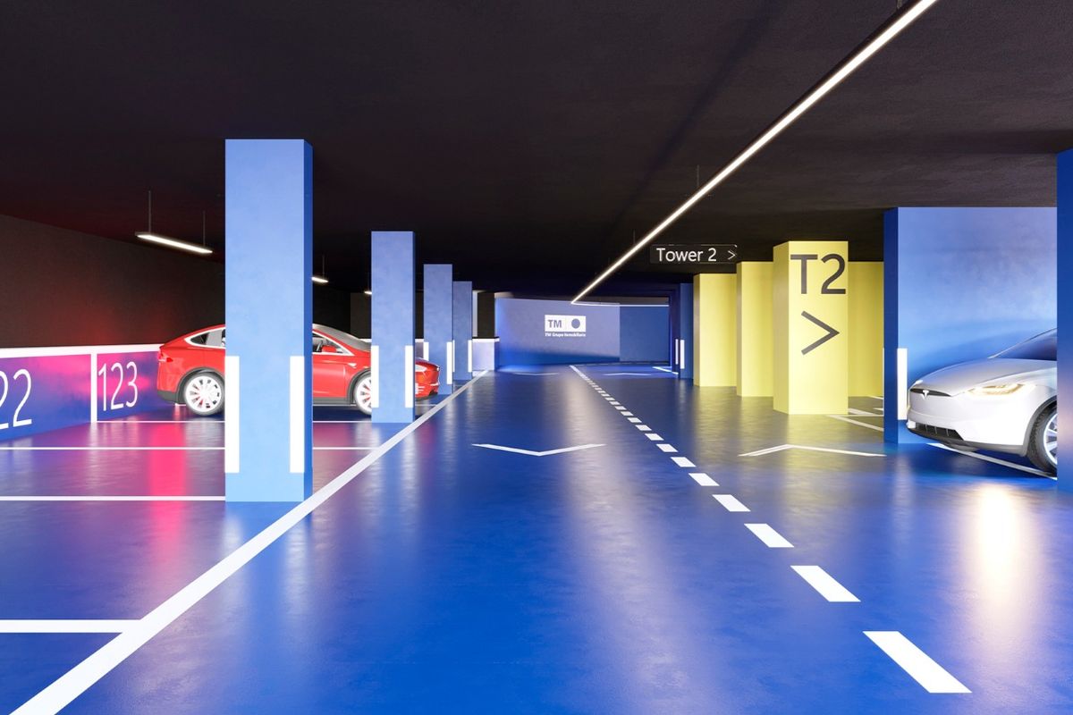 Ondergrondse parkeerfaciliteit in penthousecomplex in Benidorm, met ruime parkeerplaatsen voor voertuigen.