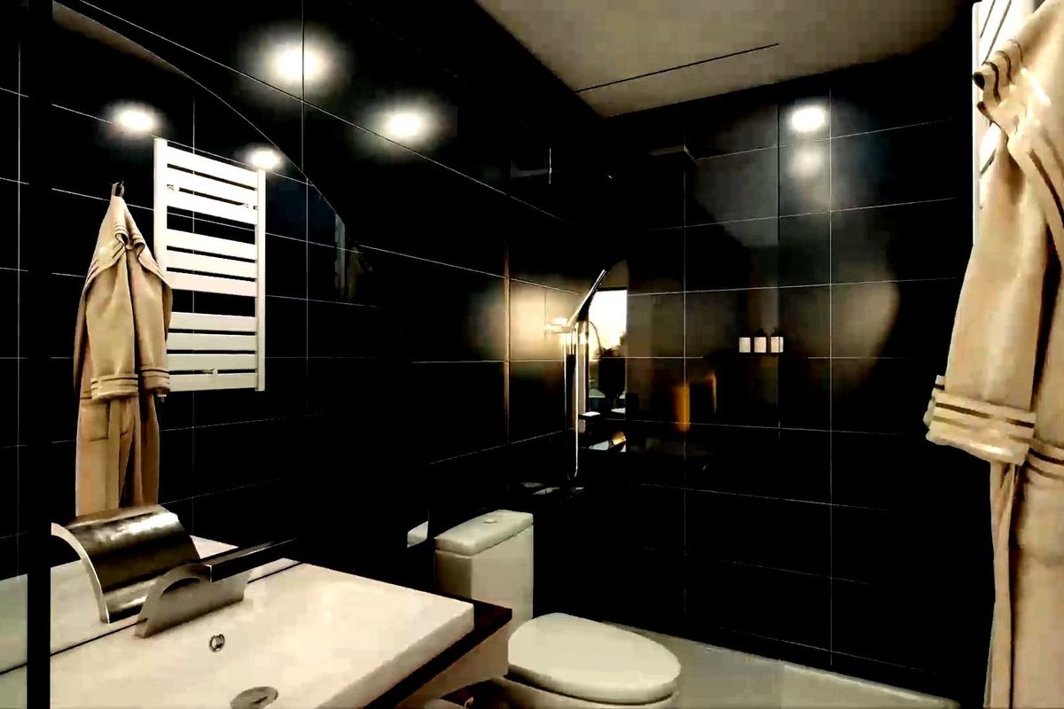 Stijlvolle zwarte badkamer in een appartement in Torrevieja, met moderne armaturen en een strak ontwerp.