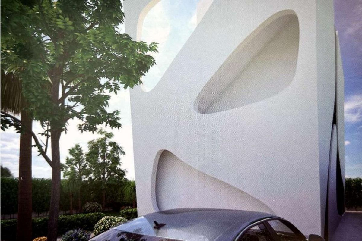 Elegante ingang van de villa in Rojales, met unieke architectuur en parkeerplaats.