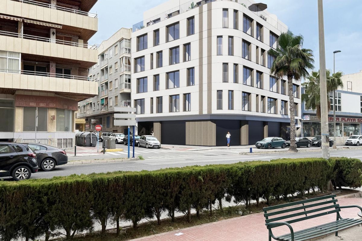 Buitenkant van het moderne 3-slaapkamer penthouse gebouw in Torrevieja, met eigentijdse architectuur.