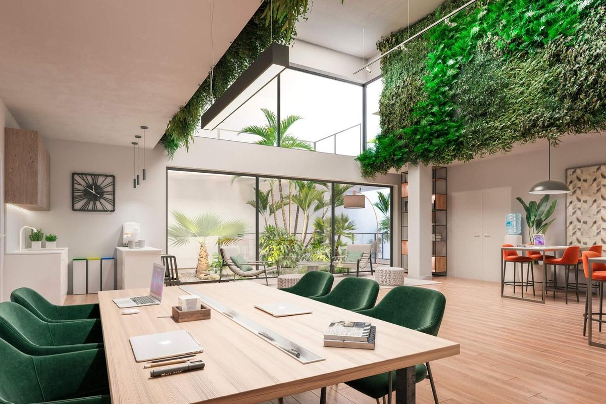 Moderne co-working ruimte met groen en open indeling, ideaal voor ontspanning in Casares, Costa del Sol.