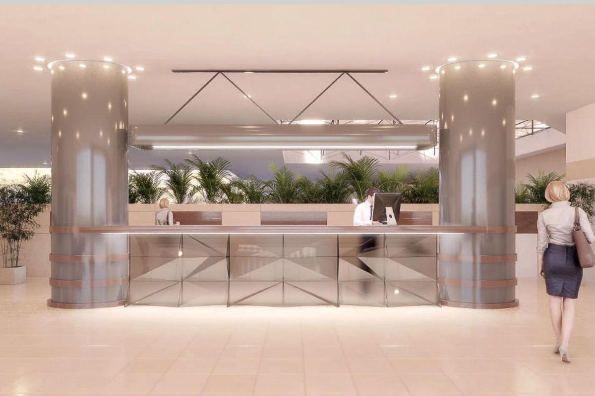 Soepele receptie in het appartementencomplex in Marbella met een stijlvolle balie en gastvrije sfeer.