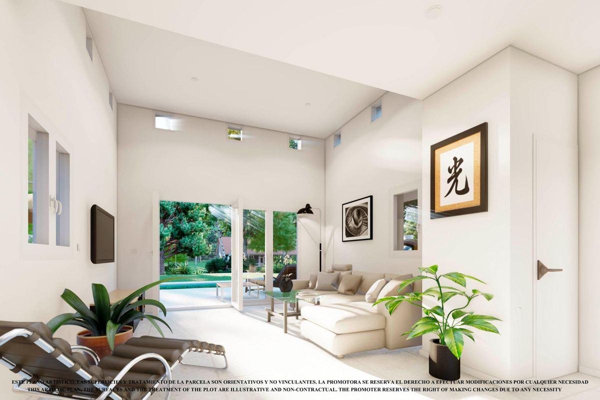 Heldere woonkamer in de villa gelegen in Los Alcazares, met grote ramen en toegang tot de tuin.