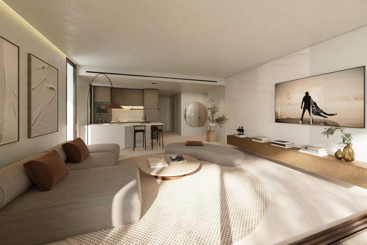 Stijlvolle woonkamer in een 2-slaapkamer appartement in Fuengirola, met een modern ontwerp en open keuken.