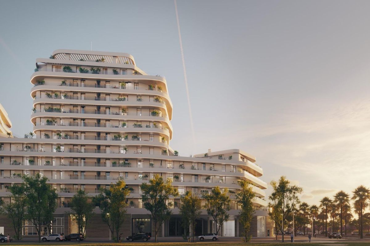 Architectuur van een nieuw gebouwd appartementcomplex in Málaga, met moderne design en groene omgeving.