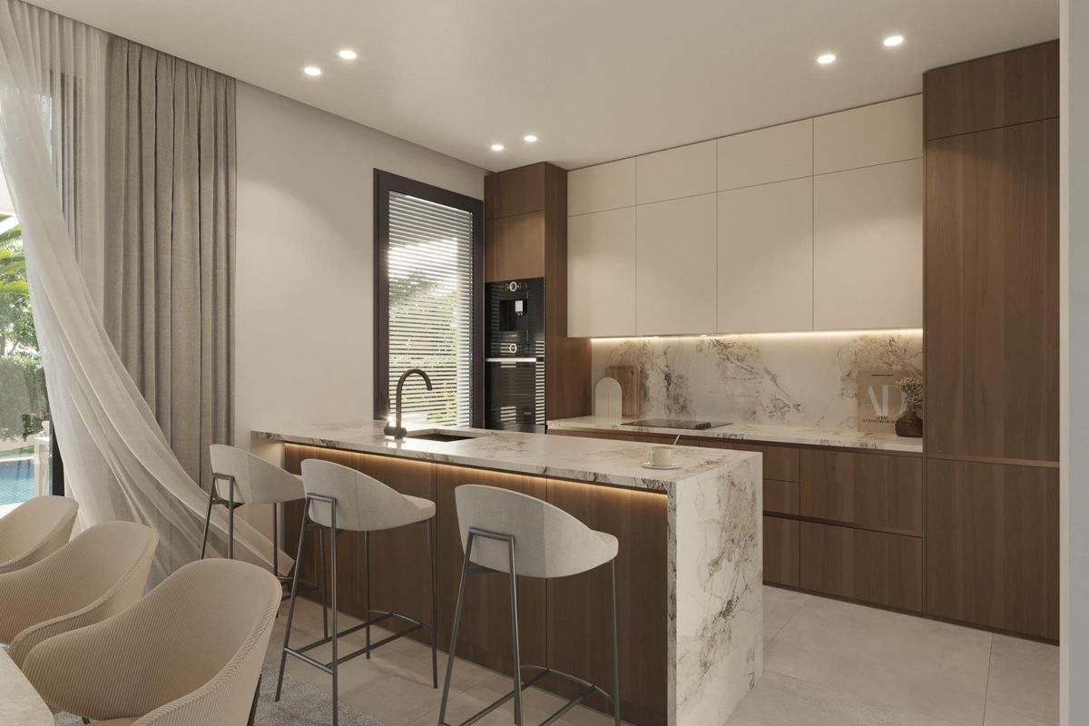 Elegante keuken in een villa met 5 slaapkamers in Finestrat, met een centraal eiland en strakke kasten.