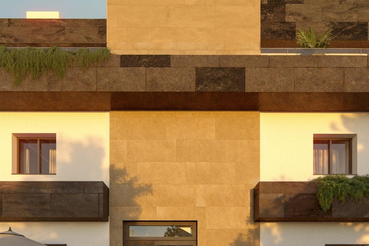 Stijlvolle buitenkant van een 3-slaapkamer appartement op de begane grond in Casares, met moderne architectuur.