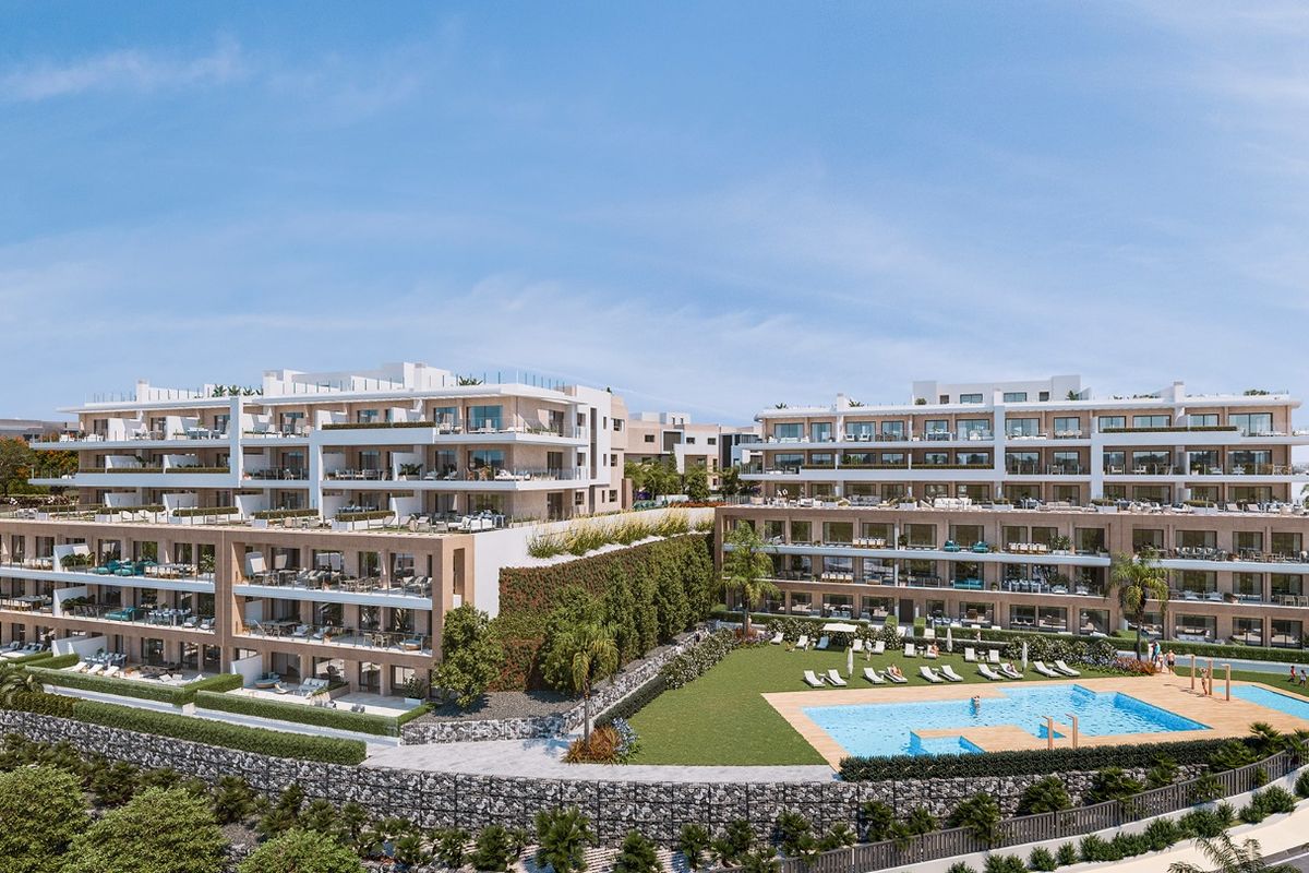 Elegante duplexappartementen met tuinen en een centraal zwembad in Estepona, Costa del Sol.