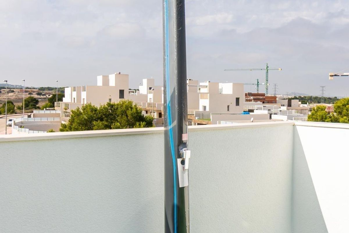 Rooftop detail of the three-bedroom villa in Orihuela Costa, featuring modern installations for utility.